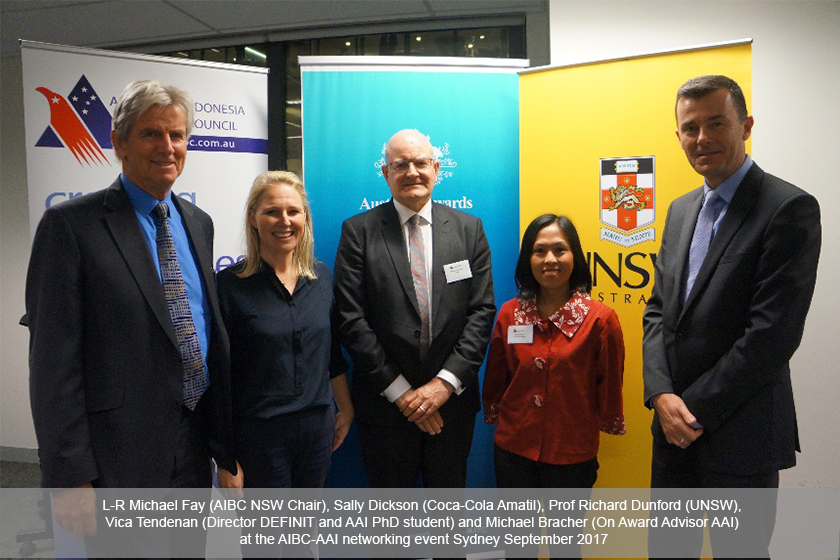 A female Australia Awards scholar smile and pose together with Australia Awards staff and guests during the Australia-Indonesia Business Council (AIBC)-Australia Awards Indonesia networking event in Sydney.